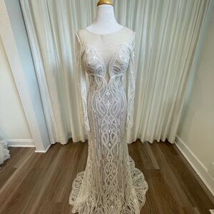 Stunning beaded and embellished long sleeve wedding dress. Zavana Couture ZC-269
